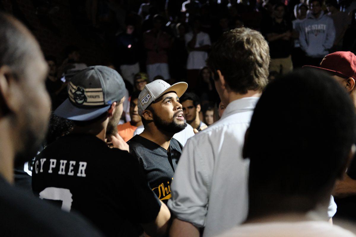 Battle Rapper DMT faces off against opponent Anderson Burrus in the 7th Annual Cypher at the Free Expression Tunnel on Monday, Aug. 27. The two rappers battled for three rounds back and forth with the crowd surrounding them. DMT went first, each battling for about two minutes.