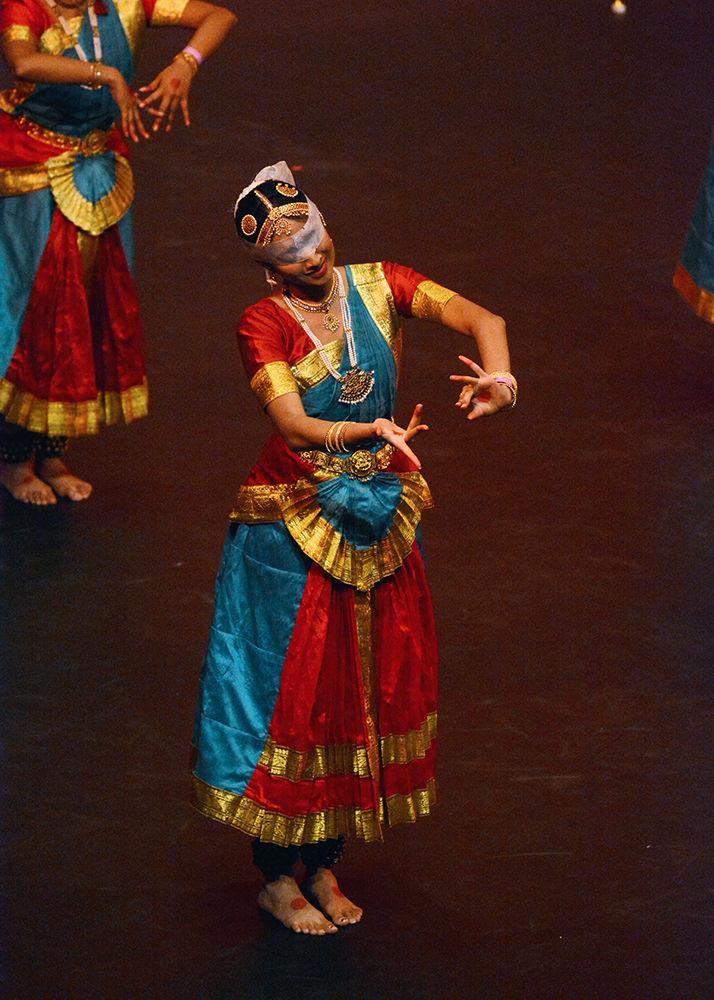 A dancer from UTD Jwala, a dance group from University of Texas at Dallas, portrays a blind woman dancing after being abused by British invaders for dancing on Saturday, Jan. 26, 2019, at Stewart Theatre.