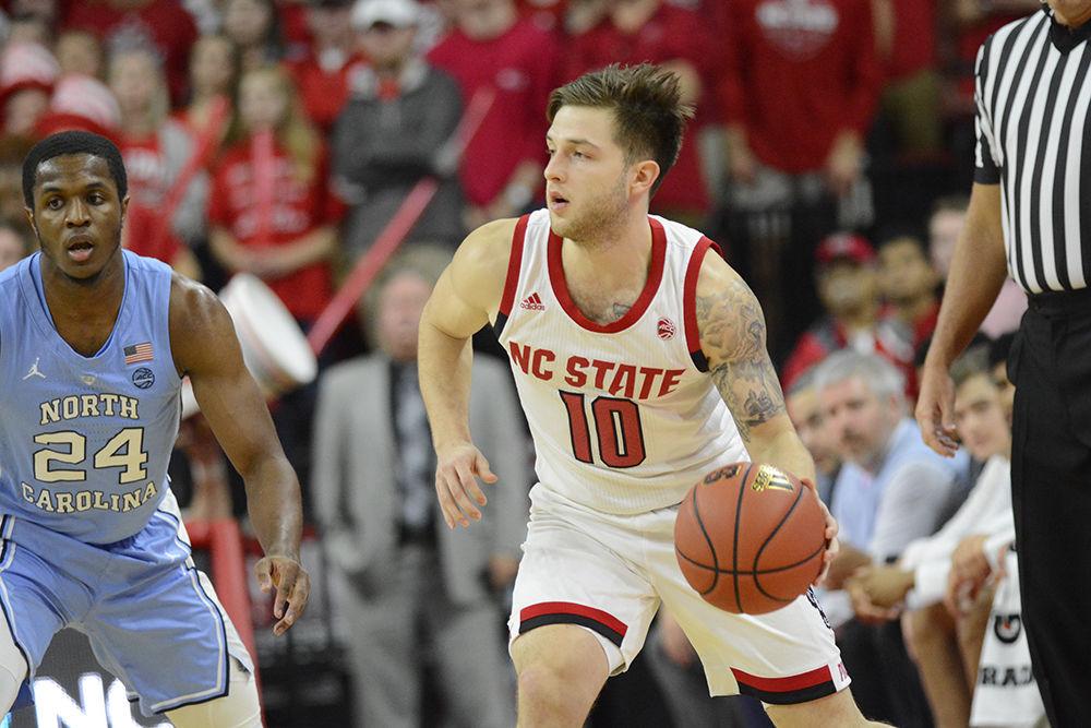 Sophomore guard Braxton Beverly&#160;dribbles against UNC-Chapel Hill on Jan. 8 at PNC Arena. Beverly tied a game-high 21 points along with four assists in the Wolfpack&#8217;s 90-82 loss.