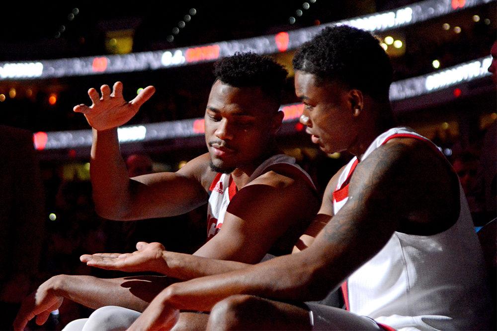 Redshirt senior guard Torin Dorn and junior guard Markell Johnson prepare to play No. 7 Auburn on Wednesday, Dec. 19, 2018 at PNC Arena. The Wolfpack won 78-71.