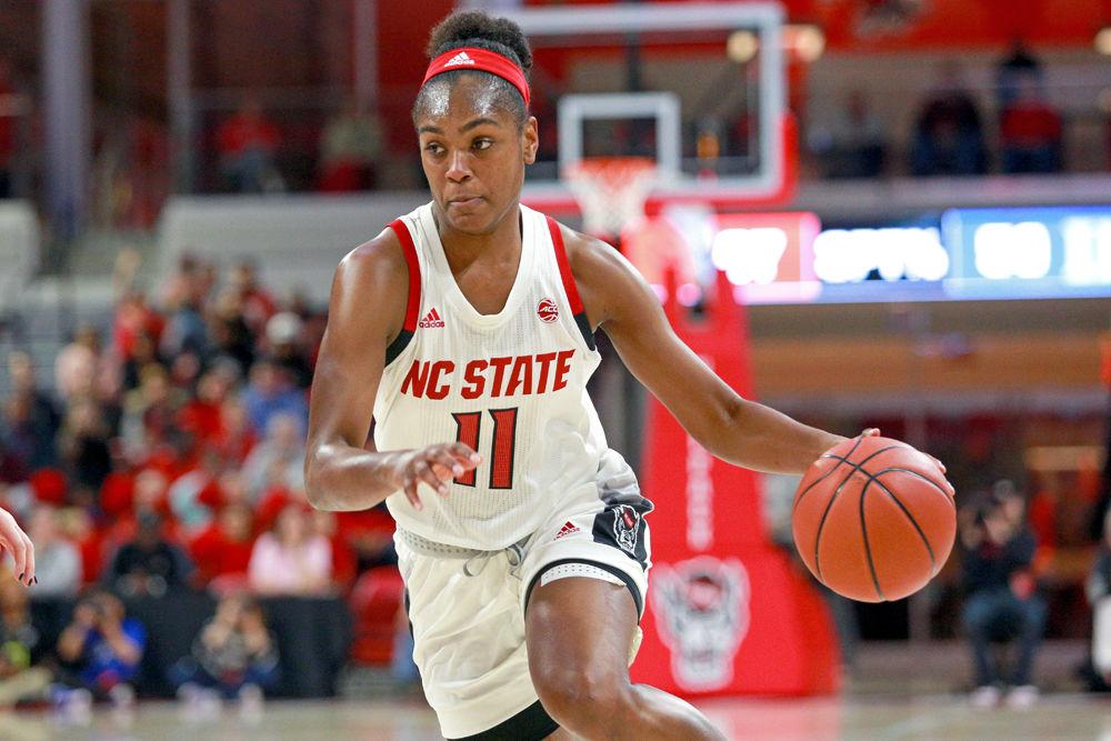 Graduate guard Kiara Leslie drives toward the interior on Thursday, Jan. 3 in Reynolds Coliseum. Leslie led the team with two blocks while putting up stats in every major category. The Pack defeated Duke 63-51 to tie the best start in school history at 14-0.