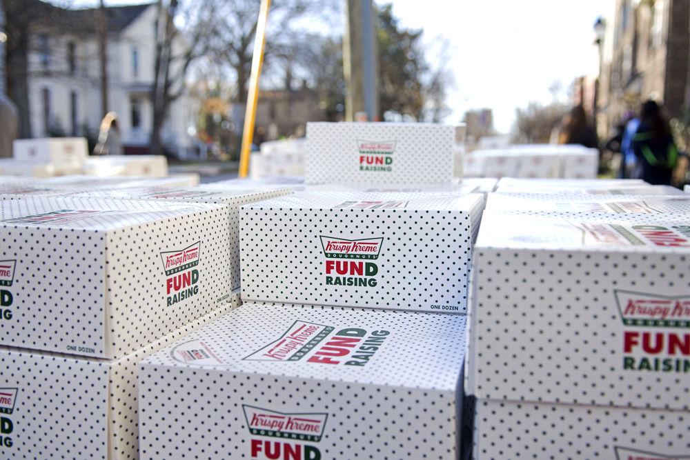 Stacks of doughnut boxes sit untouched at the midway checkpoint during the Krispy Kreme Challenge on Saturday, Feb. 3, 2018. Following the race, the 50 dozen extras were donated to the Raleigh Police and local homeless shelters respectively.