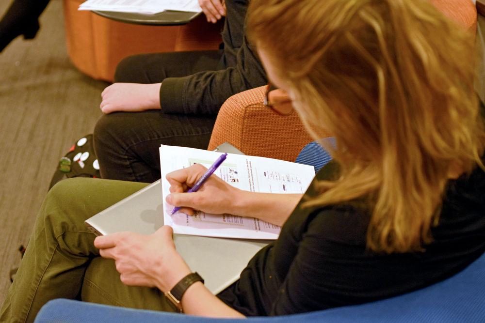 *Editor's note: the original photo has been replaced.
Anna Dye, a graduate student studying plant biology, prepares her comment on Title IX of the Education Amendments of 1972 at the Title IX Comment-Writing Party. This event was held by the Women's Center at Talley Student Union on Monday, Jan. 14.