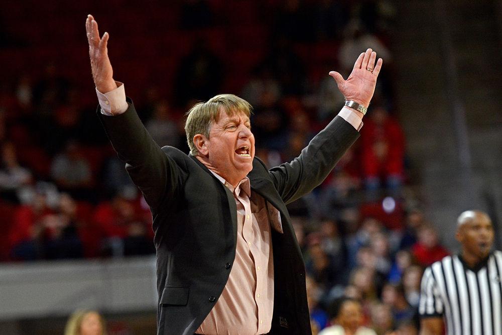 Head coach Wes Moore yells from the bench on Sunday, Jan. 20 at Reynolds Coliseum. The Wolfpack beat Virginia Tech 70-61 in overtime.