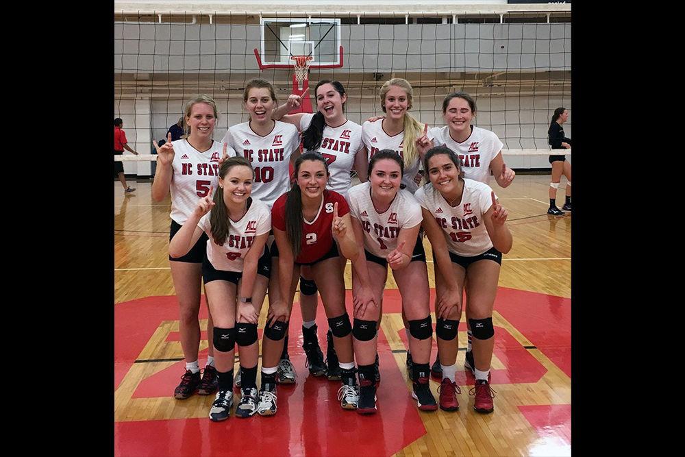 The 2017 NC State women's club volleyball team poses for a team picture in Carmichael Gym. The team won Nationals in 2016.