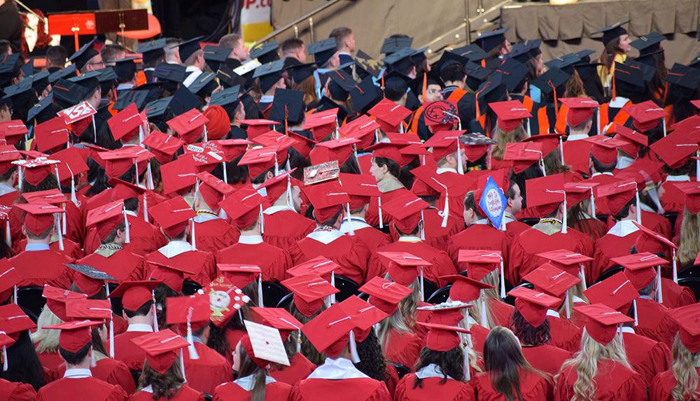 Students can be seen dressed in NC State cap, gown and hoods during the fall commencement ceremony at PNC Arena on Wednesday, Dec. 19, 2018.
