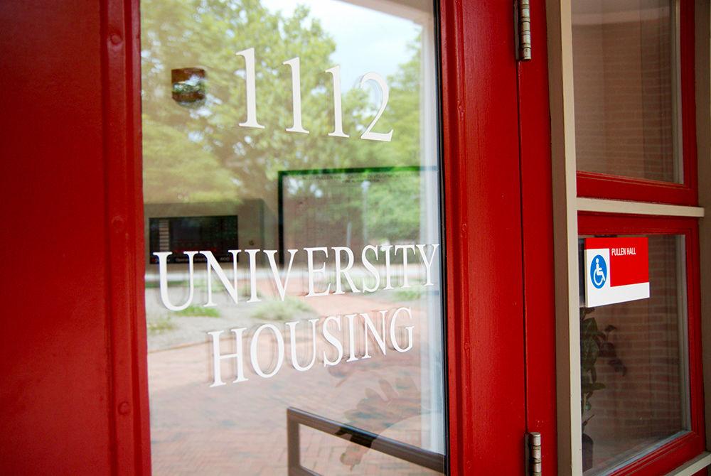 The University Housing office's front door at Pullen Hall, behind which decisions of where students are made on Monday, July 10. Housing has become a hot topic of discussion with a new rule requiring all incoming freshmen to live on campus. Complaints have come from all sides, from local freshmen wishing to live off campus and returning students concerned about a lack of available housing on campus with the increased demand.