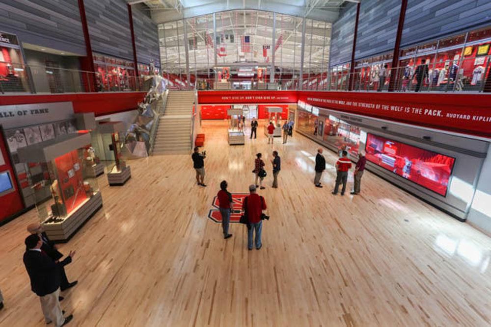 Media members take in the renovations of Reynolds Coliseum in the BB&amp;T Grand Hall of Reynolds Coliseum on Sept. 7, 2016.