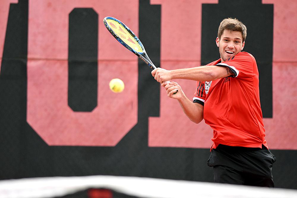 Junior Alexis Galarneau, playing first seed in singles, returns a ball during a match against South Carolina at the J.W. Isenhour Tennis Center on Saturday, Feb. 9. The Wolfpack lost 6-1 to the Gamecocks and won 7-0 against the North Carolina A&amp;T Aggies later that day.