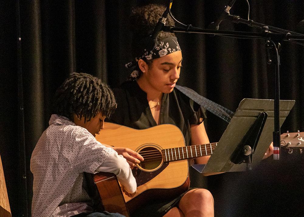 Camari Peele, a student in the Musical Empowerment program, performs alongside his mentor, Madissen Keys, a first-year studying psychology and music, at the annual showcase for Musical Empowerment in Talley Student Union on Saturday, Feb. 9, 2019. Musical Empowerment is an organization that pairs a mentor with an elementary school aged student who would not otherwise have access to a music education.