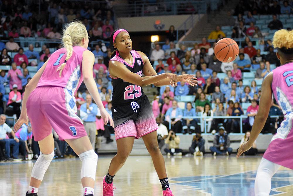 Sophomore forward Kayla Jones passes the ball during the game against UNC-Chapel Hill on Sunday, Feb. 24, 2019 in Carmichael Arena. The Wolfpack beat the Tarheels 74-69.