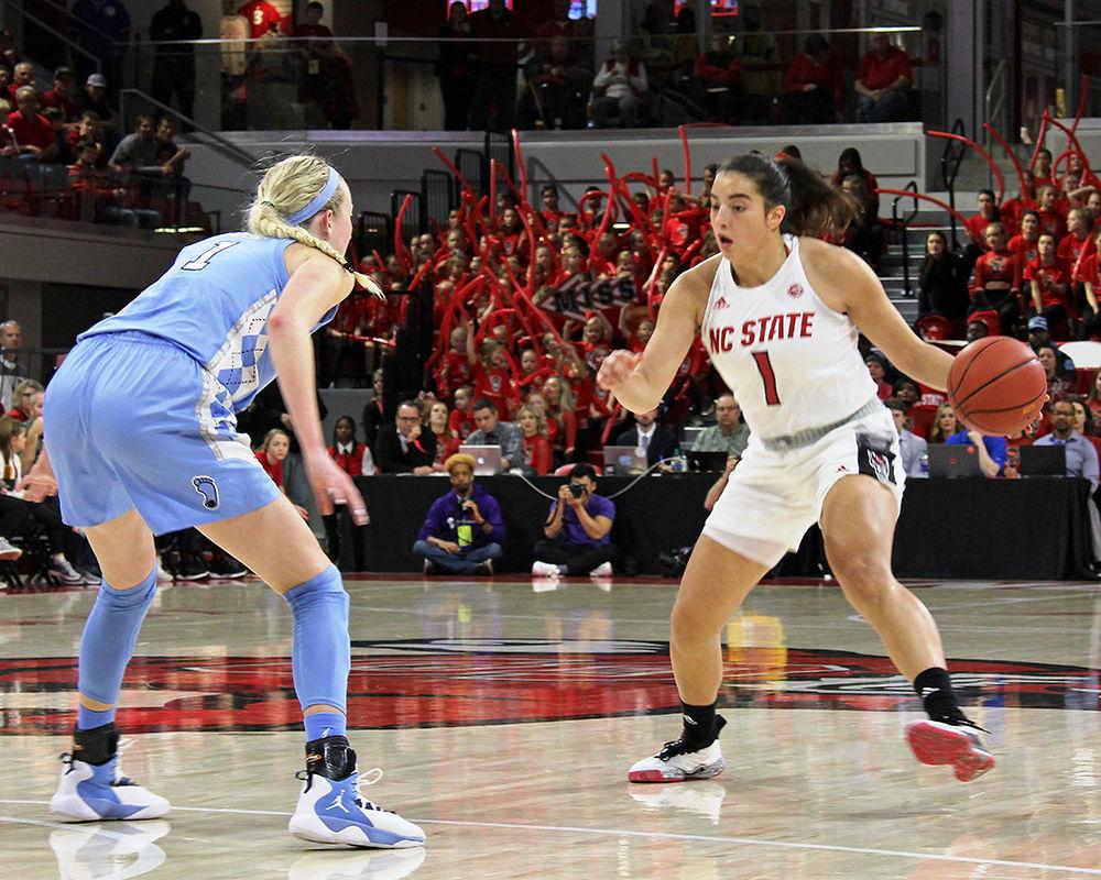 Junior guard Aislinn Konig dribbles the ball while UNC-Chapel Hill guard Taylor Koenen plays defense. The NC State women's basketball team lost 64-51 against UNC-Chapel Hill on Feb. 3 at Reynolds Coliseum.