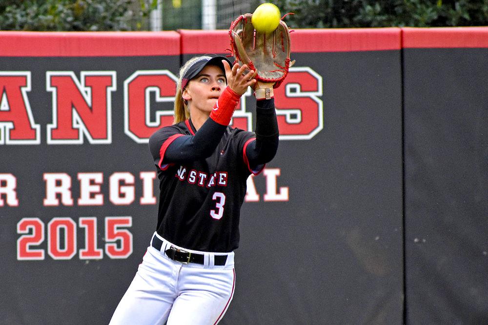 Sophomore left fielder Sam Russ catches a fly ball on Sunday, Feb. 17, 2019 at Dail Softball Stadium. Russ went 1-2 with one run scored as NC State lost to Wisconsin 6-3.