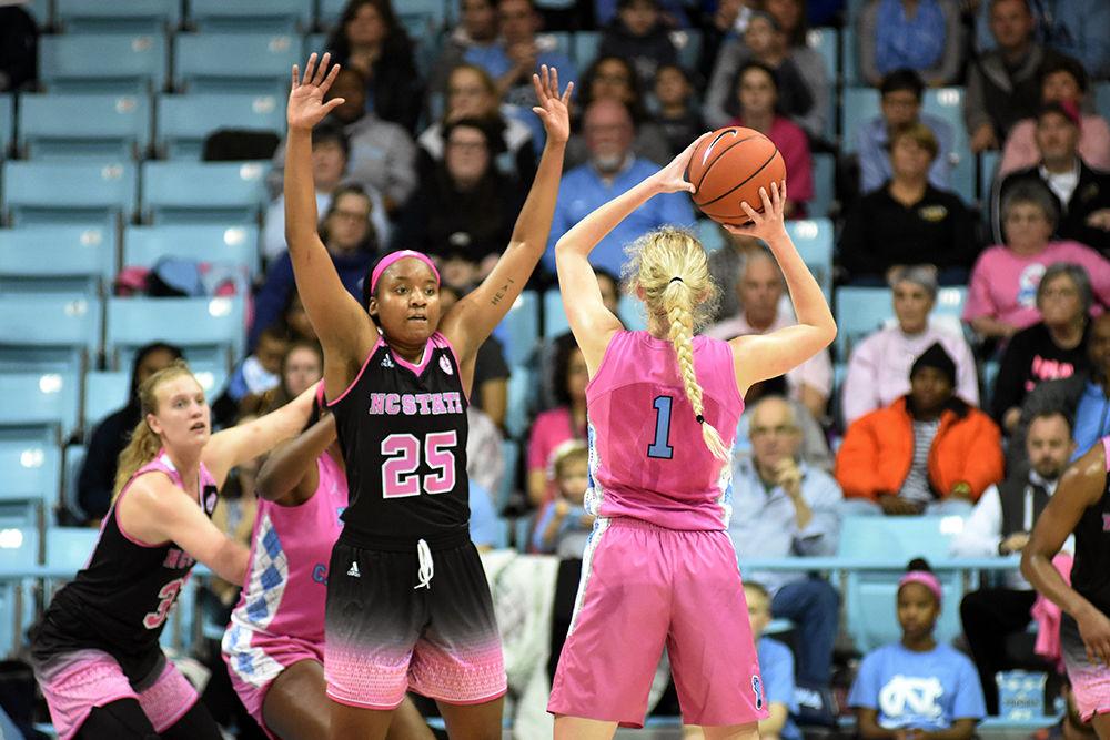 Sophomore forward Kayla Jones attempts to block a UNC-Chapel Hill attacker during the game against UNC-Chapel Hill on Sunday, Feb. 24, 2019 in Carmichael Arena. The Wolfpack beat the Tarheels 74-69.
