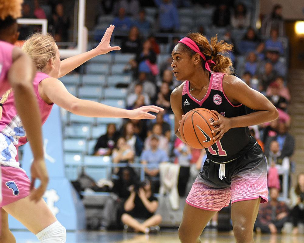 Graduate guard Kiara Leslie holds the ball during the game against UNC-Chapel Hill on Sunday, Feb. 24, 2019 in Carmichael Arena. The Wolfpack beat the Tarheels 74-69.