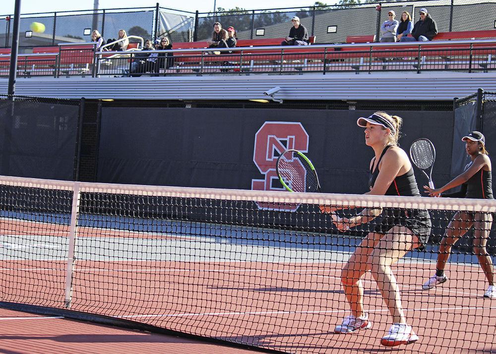 Freshman Alana Smith and junior Anna Rogers compete in a doubles match against Texas Tech at J.W. Isenhour Tennis Complex on Feb. 1. Smith and Rogers won their match 6-2.