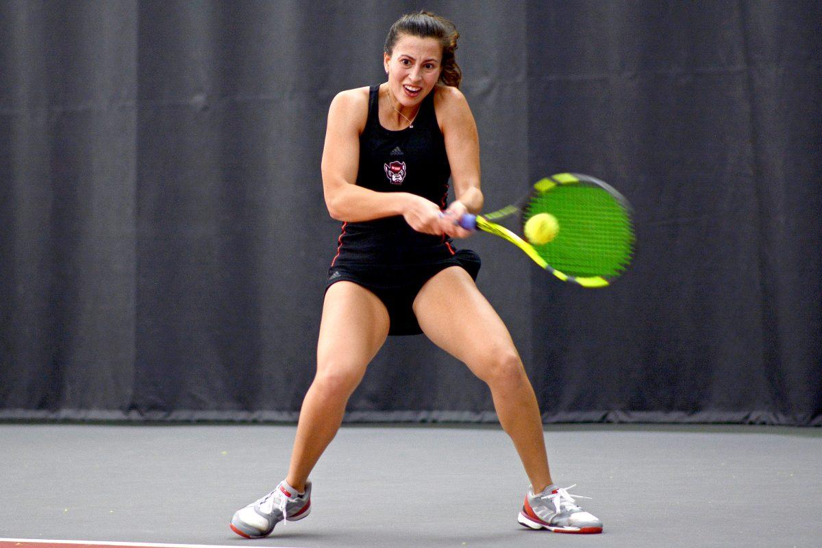 Senior Bianca Moldovan returns a volley against James Madison University junior Jona Roka on Saturday, Feb. 16, 2019 at J.W. Isenhour Tennis Center. Moldovan defeated Roka 7-5, 6-3.