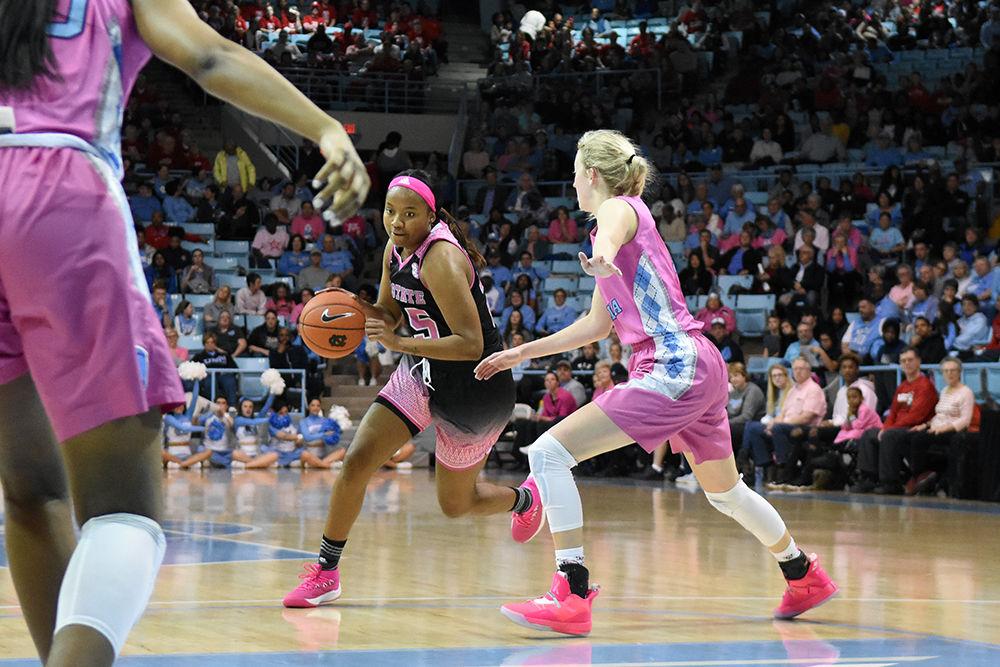 Sophomore forward Kayla Jones runs with the ball during the game against UNC-Chapel Hill on Sunday, Feb. 24, 2019 in Carmichael Arena. The Wolfpack beat the Tarheels 74-69.