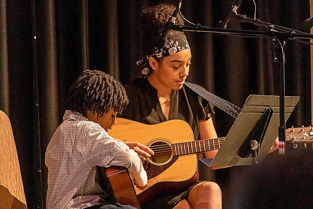 Camari Peele, a student in the Musical Empowerment program, performs alongside his mentor, Madissen Keys, a first-year studying psychology, at&#160;Musical Empowerment Annual Showcase in Talley Student Union on Saturday, Feb. 9. Musical Empowerment is an organization that pairs a mentor with an elementary school aged student who would not otherwise have access to a music education.