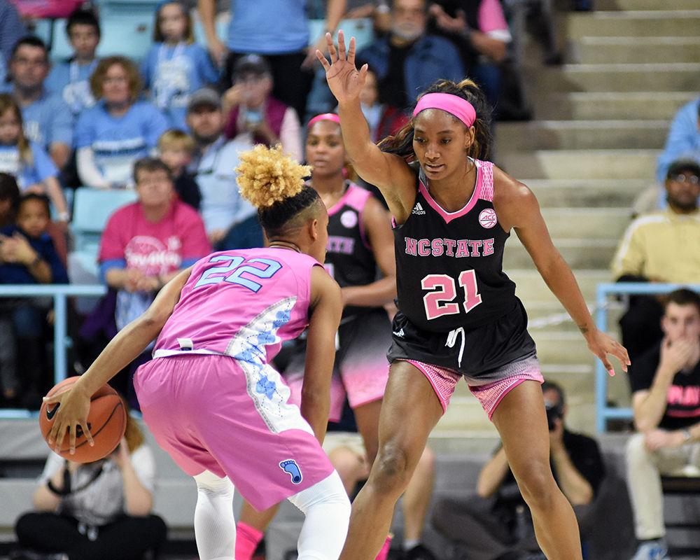 Senior forward DD Rogers attempts to block a UNC-Chapel Hill attacker during the game against UNC-Chapel Hill on Sunday, Feb. 24, 2019 in Carmichael Arena. The Wolfpack beat the Tarheels 74-69.