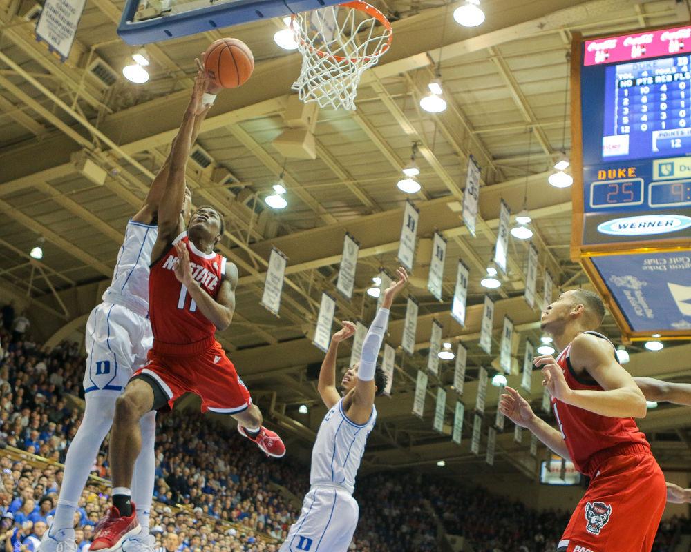 Junior guard Markell Johnson gets blocked after slashing to the basket. Johnson recorded his first double-double with 16 points and 10 rebounds in the 94-78 loss to Duke on Saturday, Feb. 16 in Cameron Indoor Stadium.