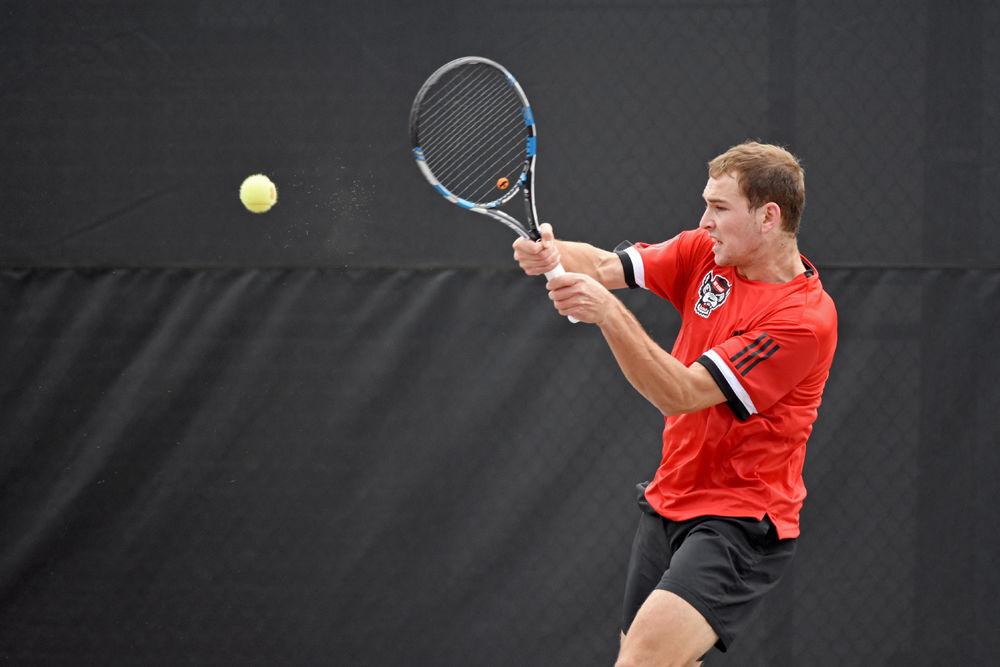 *Editor's note: the original photo has been replaced.
Yannai Barkai, a freshman playing third seed in singles against South Carolina, returns a ball to his opponent in the J.W. Isenhour Tennis Center on Saturday, Feb. 9. Barkai earned NC State's only point during their game against the Gamecocks, resulting in a 6-1 loss. Later that day, the Wolfpack won against the North Carolina A&amp;T Aggies 7-0.
