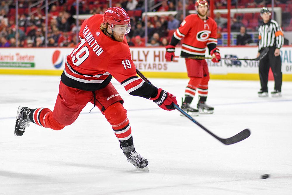 Carolina Hurricanes defender Dougie Hamilton shoots during the game versus the L.A. Kings on Tuesday, Feb. 26, 2019 in PNC Arena. Hamilton scored two goals for the Canes. The Hurricanes beat the Kings 6-1.