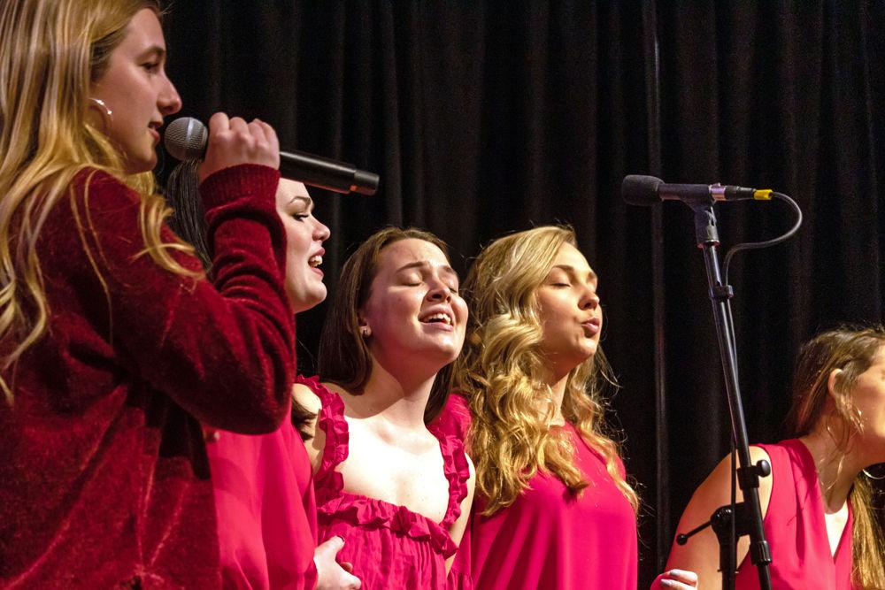 Members of Ladies in Red perform at&#160;Musical Empowerment Annual Showcase in Talley Student Union on Saturday, Feb. 9. Musical Empowerment is an organization that pairs a mentor with an elementary school aged student who would not otherwise have access to a music education.