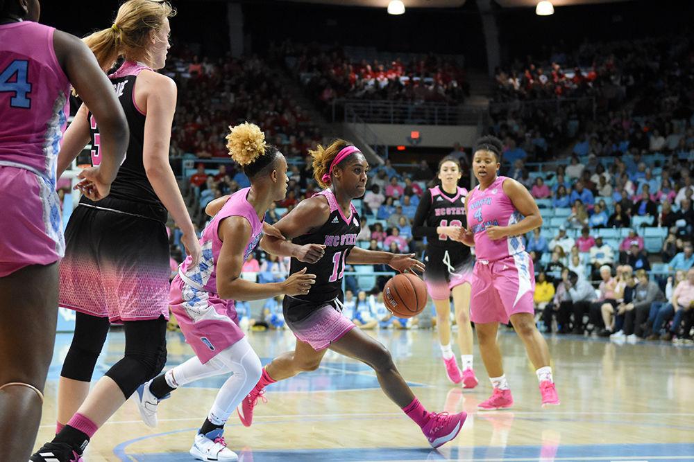 Graduate guard Kiara Leslie runs with the ball during the game against UNC-Chapel Hill on Sunday, Feb. 24, 2019 in Carmichael Arena. The Wolfpack beat the Tarheels 74-69, with Leslie scoring 21 of those points.