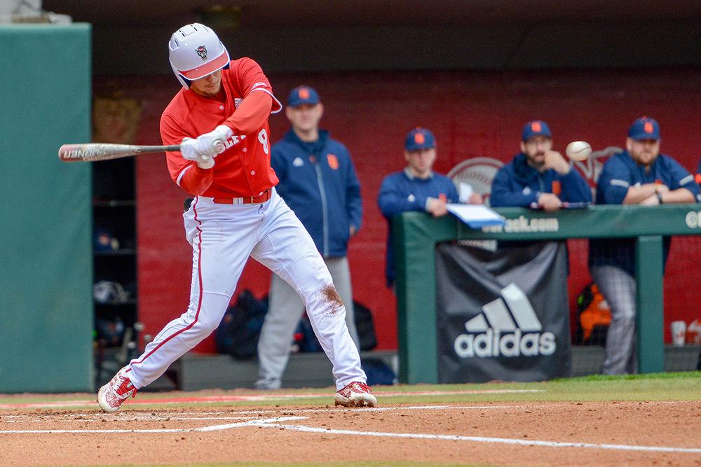 Junior infielder Will Wilson hits a home run against the Bucknell Bison on Saturday, Feb. 16, in Doak Field at Dail Park. The Wolfpack beat the Bison 14-2.