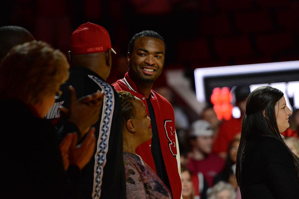 Former forward T.J. Warren smiles after seeing his honored jersey before NC State&#8217;s game against Wake Forest on Sunday, Feb. 25 at PNC Arena. Warren wore number 24 for the Wolfpack and played for the team from 2012-2014. He won ACC Player of the Year and second-team All-American in 2014, along with many other honors.