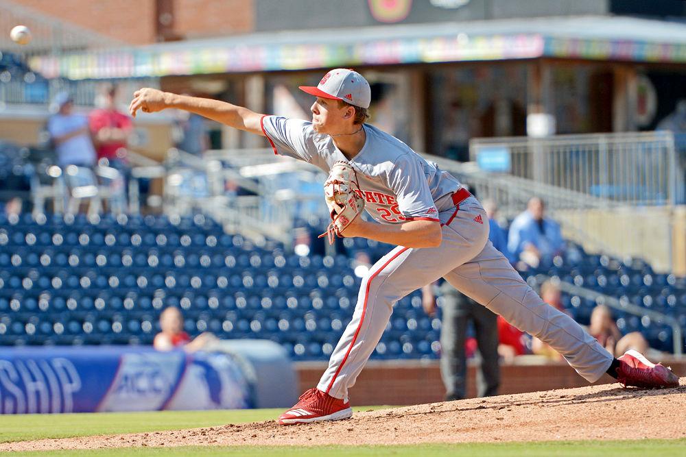 Freshman pitcher Reid Johnston pitches the ball against Virginia at the Durham Bulls Athletic Park on Thursday, May 24, 2018. Johnston pitched 2.2 innings, giving up three hits and two earned runs as the Wolfpack lost 4-2.