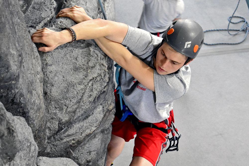 Matthew Klassa, a third-year studying chemical and paper science engineering, scales the Climbing Wall at Carmichael Gym on Tuesday, Feb. 13, 2019.