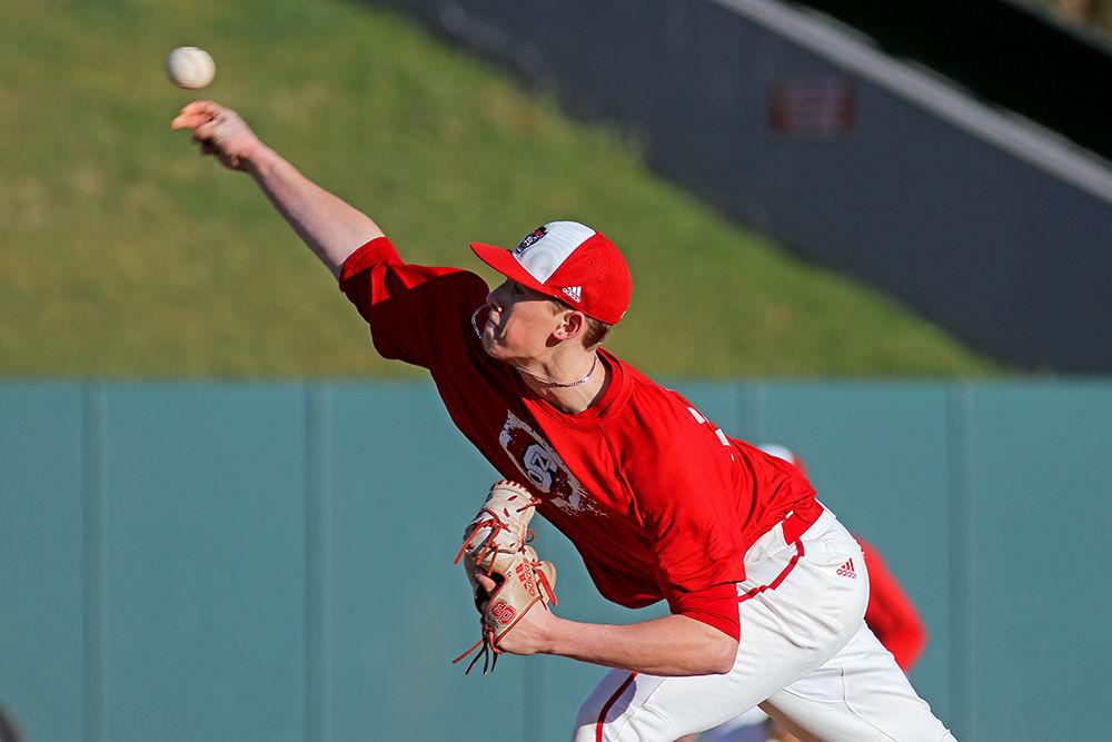 Sophomore pitcher Reid Johnston delivers the ball during the scrimmage at Doak Field on Jan. 25. The Wolfpack's first game will be against Bucknell on Friday, Feb. 15 at 3 p.m. at Doak Field.