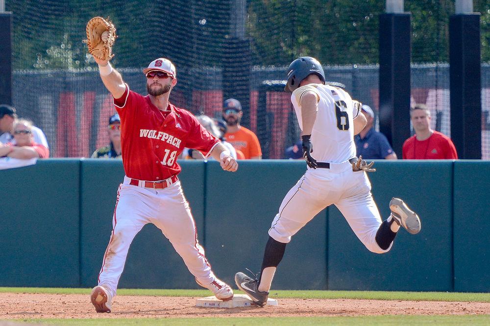 Junior infielder Evan Edwards puts out Army catcher Trey Martin on Sunday, June 3, 2018 at Doak Field. Edwards hit two home runs versus Army as the Wolfpack beat the Black Knights 11-1.