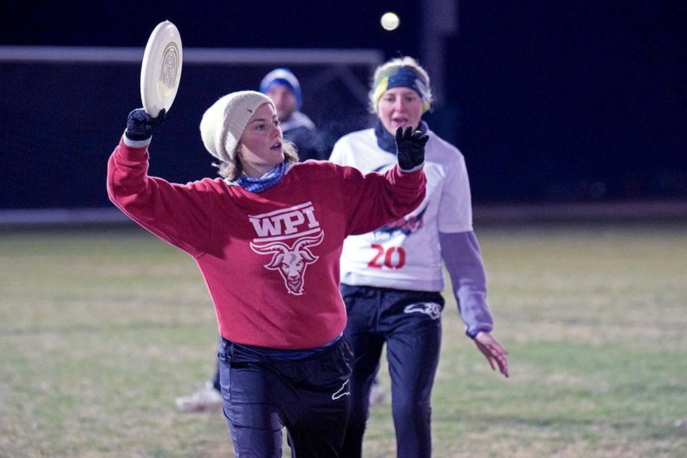 Carmen Tormey of the NC State Women&#8217;s Club Ultimate team throws a flying disc to another player during a scrimmage game at their practice on Thursday, Jan. 31, 2019 at Method Fields. The Club Ultimate team practices throughout both the fall and spring and competes in tournaments during the spring semester.