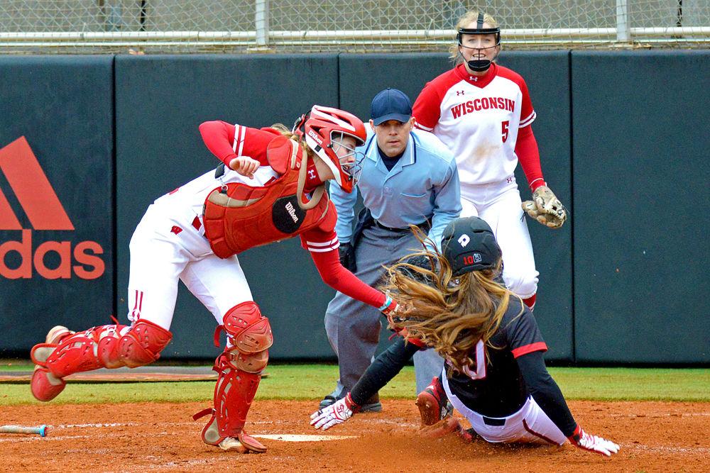 Sophomore infielder Logan Morris attempts to slide into home on Sunday, Feb. 17 at Dail Softball Stadium. Morris went 1-3 with one double, one run batted in and one run scored. The Wolfpack lost 6-3.