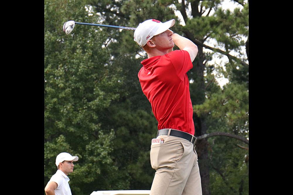 Senior Stephan Franken takes a swing to drive the ball down range.&#160; Franken finished strong with a score of 69 in the 2nd round at Lonnie Poole Golf Course on Oct. 6th 2018.