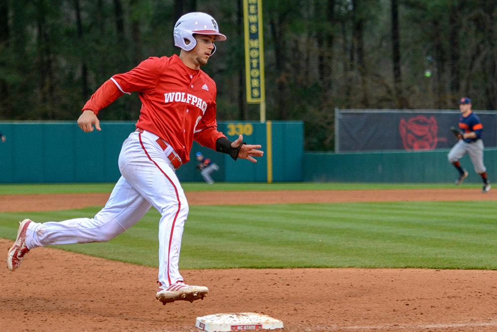 Junior infielder Will Wilson rounds third base and heads to home plate during the game versus the Bucknell Bison on Saturday, Feb. 16, in Doak Field at Dail Park. The Wolfpack beat the Bison 14-2.