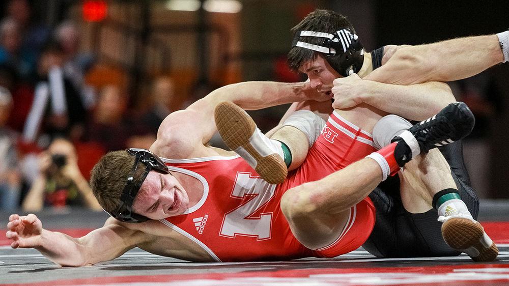 Redshirt senior Sean Fausz, No. 6 in the 125 weight class tries to pin No. 11 Zeke Moisey. Fauz won with an 8-2 decision. The No. 7 Wolfpack were able to defeat No. 11 Nebraska by tying the score int he last bout and finishing 18-17 on Sunday, Dec. 16 in Reynolds Coliseum.