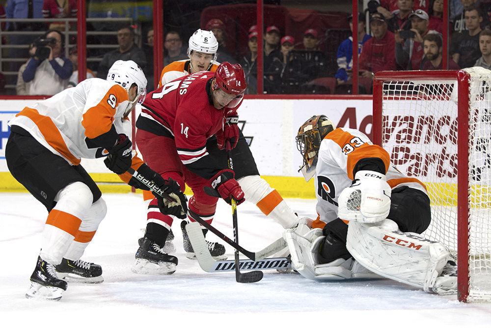 Right winger Justin Williams attempts to score on the Philadelphia Flyers at PNC Arena, Saturday, March 30. In the same shift, Williams had an assist to fellow right wing Teuvo Teravainen to tie up the game in an action-packed first period. The Canes took flight, winning against Philadelphia 5-2 in regulation.