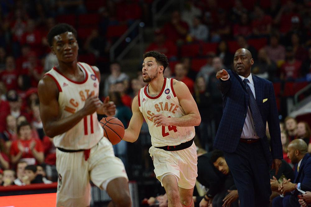 Redshirt sophomore guard Devon Daniels brings the ball up the floor against Wake Forest on Sunday, Feb. 24, 2019 at PNC Arena. Daniels recorded 10 points on 4-9 shooting along with six rebounds in the Wolfpack&#8217;s 94-74 win.