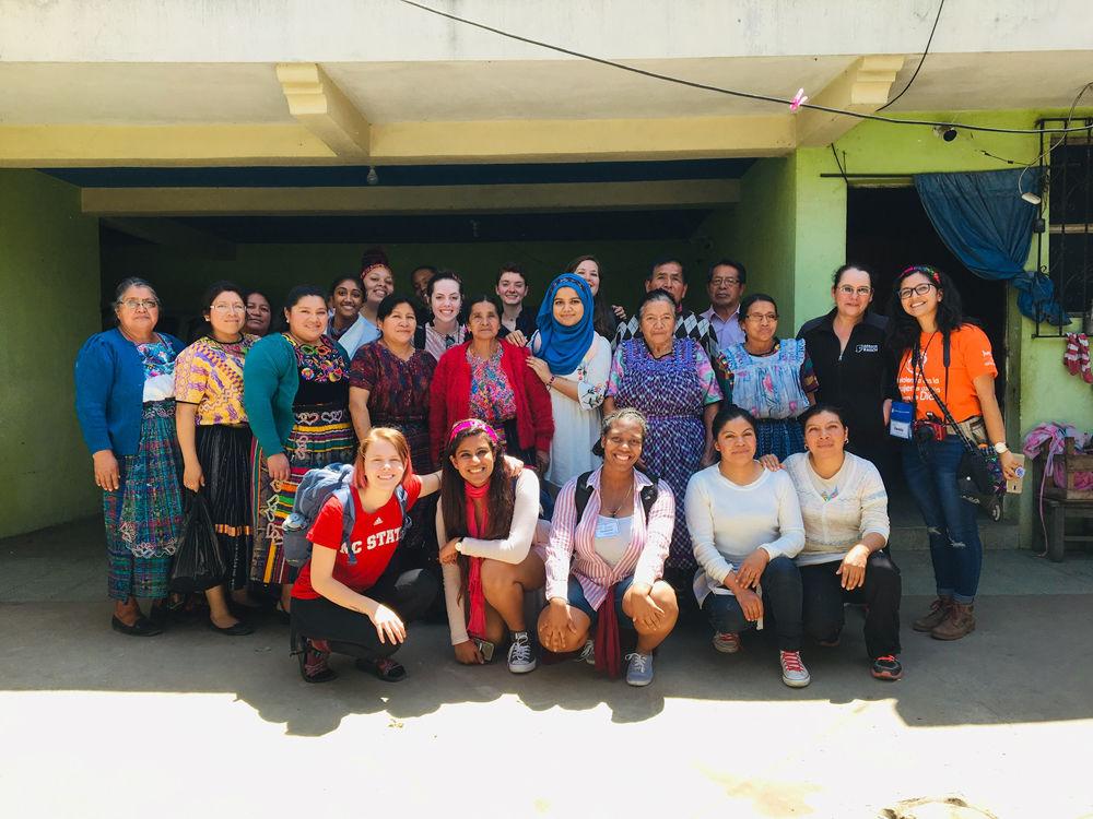 This is a picture of the Guatemala Gender ASB group and the women of the Fraternidad de Presbiteriales Maya. They provide local Guatemalans with sustainable ways to farm and cook.