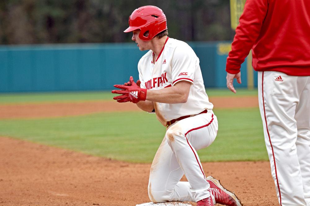 Sophomore catcher Patrick Bailey celebrates after reaching third base against Pittsburgh on Saturday, March 9, 2019 at Doak Field. The Wolfpack won 21-3.