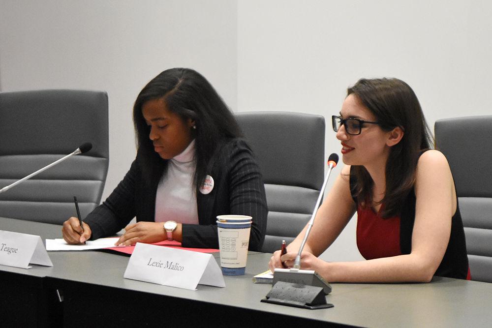 Student body vice president candidates Nicole Teague, a third-year studying business administration, and Lexie Malico, a third-year Ph.D student in the chemistry department, answer questions at the student government election debate in the Senate Chambers in Talley Student Union on Thursday, Feb. 28.&#160;