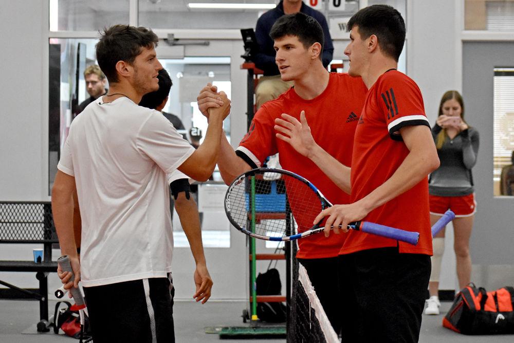 Igor and Ivan Saveljic shake hands with their opponents after their 7-6 doubles win on Wednesday, March 20, 2019 at J.W. Isenhour Tennis Center. The Wolfpack lost to Wake Forest 4-2.