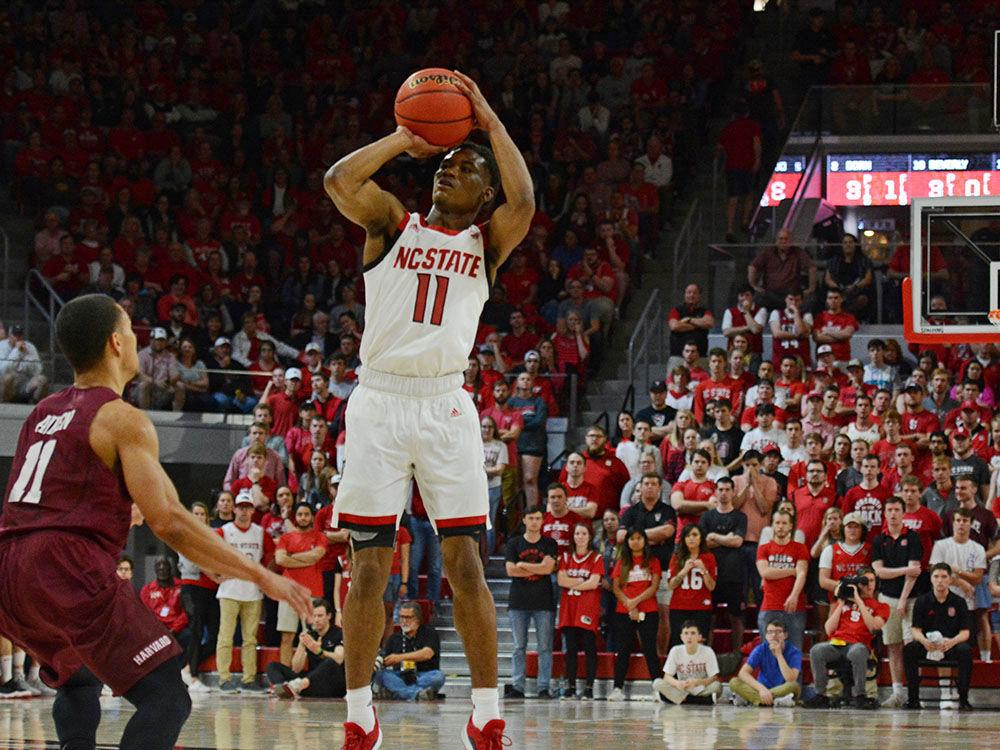 Junior guard Markell Johnson attempts a shot during the game against Harvard on Sunday, March 24, at Reynolds Coliseum. The Wolfpack won 78-77.
