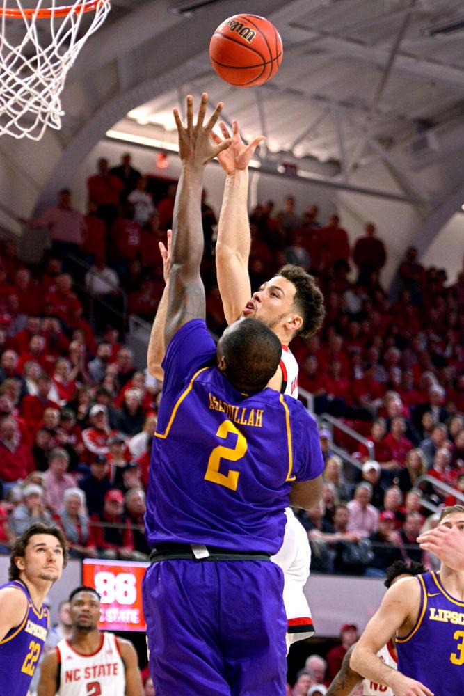 Redshirt sohpomore guard Devon Daniels throws up a hook shot in Reynolds Coliseum on Wednesday, March 27, 2019. Daniels scored 10 points and had 2 rebounds. The Wolfpack lost 94-93 to Lipscomb.