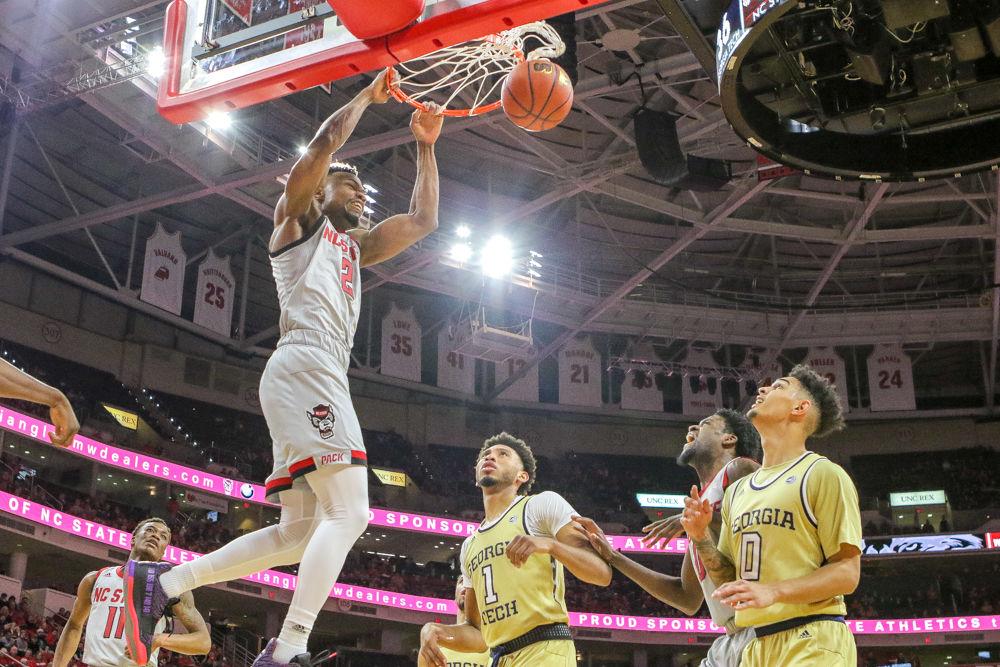 Redshirt senior guard Torin Dorn slams a dunk. Dorn had 12 points and eight rebounds while leading the team with two steals in a day where the three just wasn't falling. The poor shooting doomed the Pack to a 63-61 loss to Georgia Tech on Wednesday, March 6 in PNC Arena.