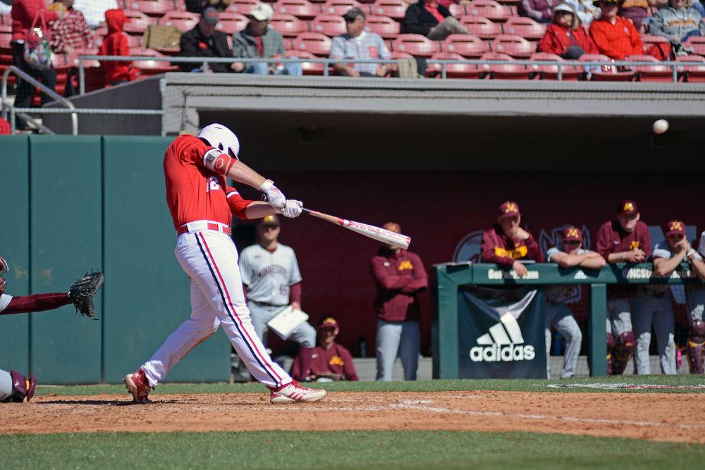 Junior center Brad Debo takes a swing during the doubleheader against Minnesota on Saturday, March 2, 2019 at Doak Field. The Wolfpack beat the Gophers 3-2, with Debo going 2-3 with one run scored.